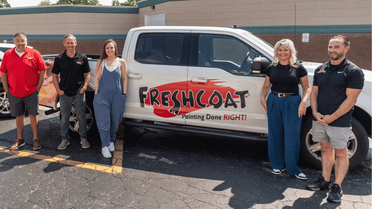 How Fresh Coat Evolved and Set New Standards Photo of Fresh Coat Painters team and branded vehicle