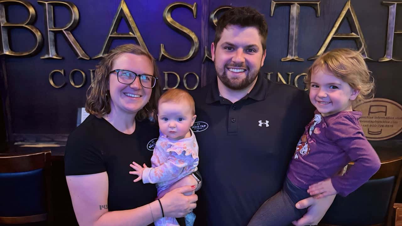 How The Brass Tap Evolved and Set New Standards Photo of The Brass Tap franchise owner Troy Nelson and family
