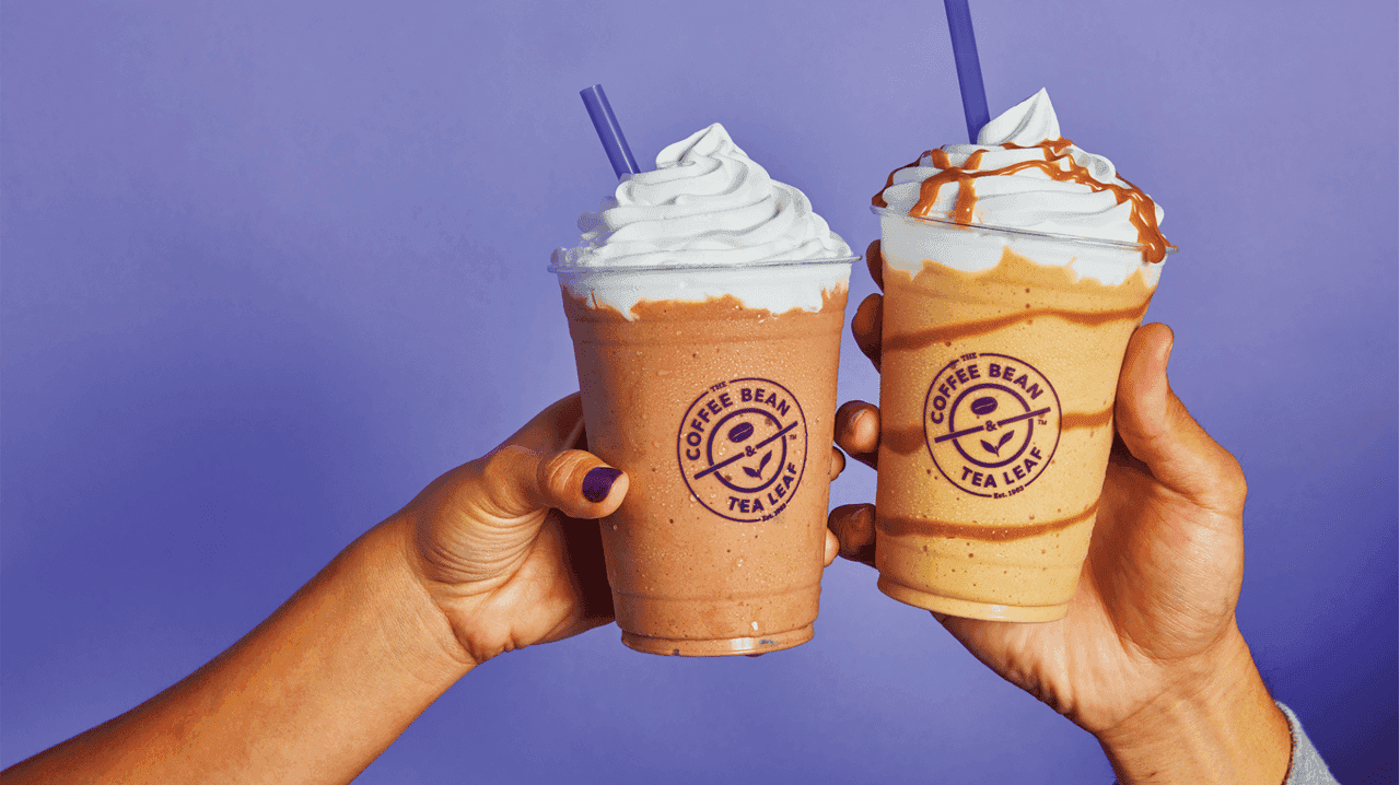 How The Coffee Bean & Tea Leaf Evolved and Set New Standards Photo of two The Coffee Bean & Tea Leaf beverages against a purple backdrop