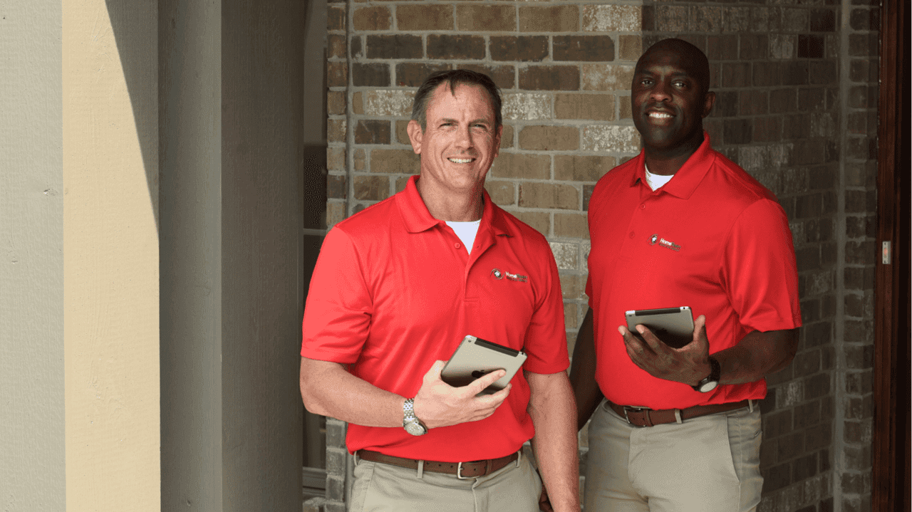 How HomeTeam Inspection Service Evolved and Set New Standards Photo of two HomeTeam Inspection Service inspectors outside a home